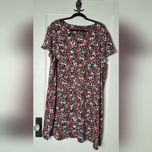 Flutter cap sleeve shift dress with visible gold zipper in back